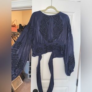 Free people Navy Satin blouse with embroidery. Open, tie back